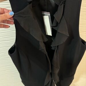 Gorgeous black vest brand new with detachable sheer black fabrics ruffle